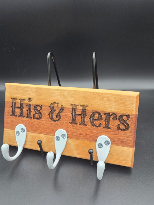 Wooden Key Hook laser engraved with His and Hers, featuring white hooks