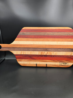 Wooden Charcuterie Board made with 7 different hardwoods made by lathe nights woodworking