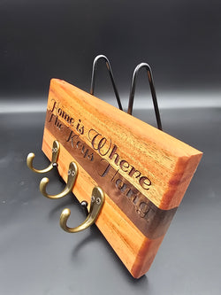 Wooden Key Holder with Home is Where the Keys Hang laser engraved made of mahogany and walnut with bronze hooks made by lathe nights woodworking