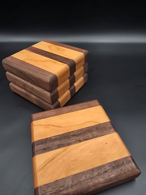 Wooden coasters, made of walnut and cherry hardwoods. Set of 4 coasters
