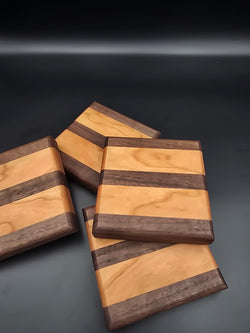 Wooden coasters, made of walnut and cherry hardwoods. Set of 4 coasters