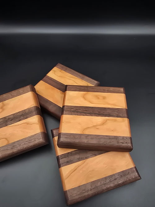 Wooden coasters, made of walnut and cherry hardwoods. Set of 4 coasters