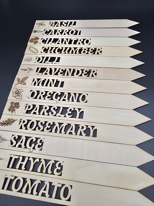 set of wooden garden markers made for different types of plants and herbs made by lathe nights woodworking