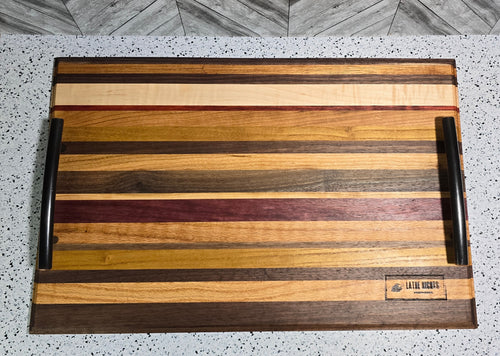 handcrafted edge grain serving tray made from a variety of hardwoods, featuring sleek bronze handles