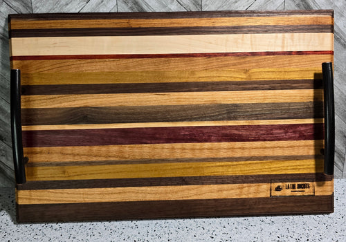 handcrafted edge grain serving tray made from a variety of hardwoods, featuring sleek bronze handles
