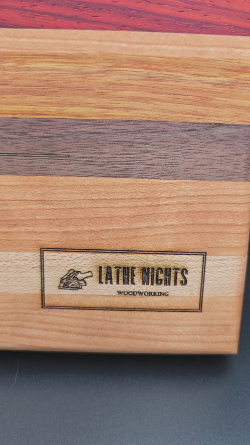 Artisanal Multi-Wood Hardwood Cutting Board | 18" x 10"