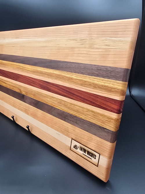 Artisanal Multi-Wood Hardwood Cutting Board | 18" x 10"