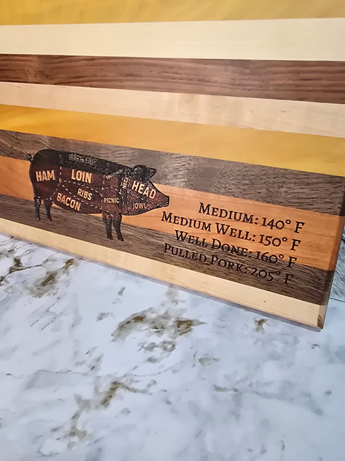 wooden cutting board laser engraved pig parts with USDA temperatures made with walnut boivian rosewood maple cherry and yellow heart