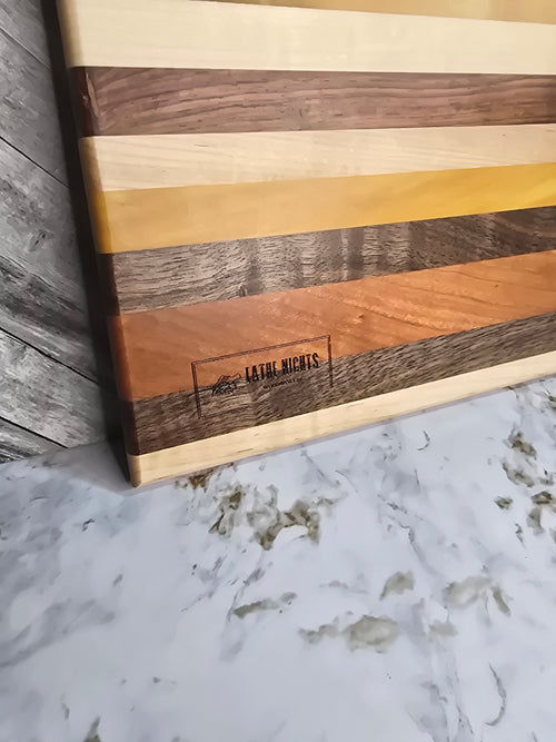 wooden cutting board laser engraved pig parts with USDA temperatures made with walnut boivian rosewood maple cherry and yellow heart