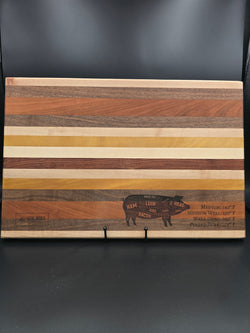 wooden cutting board laser engraved pig parts with USDA temperatures made with walnut boivian rosewood maple cherry and yellow heart