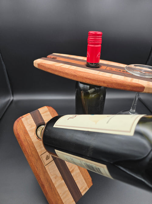 Wooden wine bottle caddy and wine balancer made by lathe nights woodworking